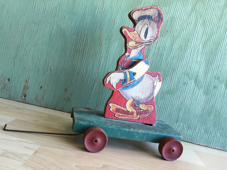 fisher price donald duck pull toy