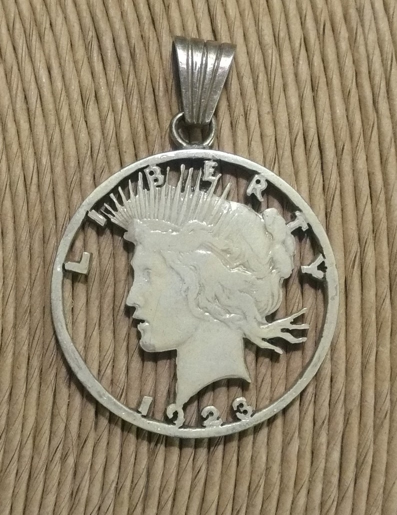 REDUCED & FREE SHIPPING...Antique 1923 Liberty Peace Dollar image 0